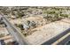 High angle aerial shot of the large property and road nearby at 4838 N Tioga Way, Las Vegas, NV 89149