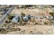 Aerial view of the property surrounded by empty lots at 4838 N Tioga Way, Las Vegas, NV 89149