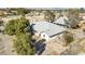 Desert home with mature landscaping, fenced yard and well-maintained exterior at 4838 N Tioga Way, Las Vegas, NV 89149