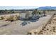 Property with ample parking, mature trees, and full fencing at 4838 N Tioga Way, Las Vegas, NV 89149