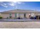Backyard with a large concrete patio and blue skies overhead at 4838 N Tioga Way, Las Vegas, NV 89149