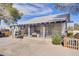 Backyard featuring a covered patio, gravel landscaping and blue skies at 4838 N Tioga Way, Las Vegas, NV 89149