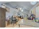 Spacious living room showcasing an open floor plan with a high ceiling and staircase at 4838 N Tioga Way, Las Vegas, NV 89149
