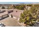 Aerial view of community showing townhomes, garages, and parking areas at 5250 S Rainbow Blvd # 2046, Las Vegas, NV 89118