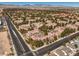 Beautiful aerial view of a neighborhood with multiple buildings and lush greenery and mature landscaping at 5250 S Rainbow Blvd # 2046, Las Vegas, NV 89118