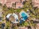 Overhead aerial of a well-maintained pool surrounded by manicured landscaping and mature palm trees at 5250 S Rainbow Blvd # 2046, Las Vegas, NV 89118