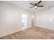 Bedroom featuring neutral carpet, a ceiling fan, and an ensuite bathroom and closet at 5250 S Rainbow Blvd # 2046, Las Vegas, NV 89118