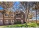 Well-maintained apartment building with lush landscaping and manicured lawn at 5250 S Rainbow Blvd # 2046, Las Vegas, NV 89118