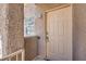 Condo front door showing the lockbox and unit number 2046 at 5250 S Rainbow Blvd # 2046, Las Vegas, NV 89118