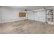 Spacious garage with concrete floor and storage space at 5250 S Rainbow Blvd # 2046, Las Vegas, NV 89118