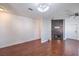 Living room with a ceiling fan, hardwood floors, and a modern fireplace at 5250 S Rainbow Blvd # 2046, Las Vegas, NV 89118