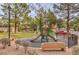 Community playground with slide and benches near apartment buildings at 5250 S Rainbow Blvd # 2046, Las Vegas, NV 89118