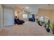 Upstairs bonus room featuring a vaulted ceiling, large windows, and plenty of space at 5640 Coe Estates Ct, Las Vegas, NV 89149
