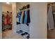 Organized walk-in closet offering ample storage space for clothing, shoes, and accessories at 5640 Coe Estates Ct, Las Vegas, NV 89149