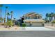 Charming home with a three-car garage and desert landscaping at 5640 Coe Estates Ct, Las Vegas, NV 89149