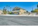 Beautiful home with well-maintained desert landscaping and a spacious driveway at 5640 Coe Estates Ct, Las Vegas, NV 89149