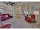 Spacious living room with high ceilings, stylish furniture, and an open floor plan at 5640 Coe Estates Ct, Las Vegas, NV 89149