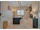 Bright office space with a large desk, window with shutters, and built in shelving at 5640 Coe Estates Ct, Las Vegas, NV 89149
