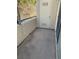 Private balcony with concrete floor and an exterior storage closet at 5710 E Tropicana Ave # 2033, Las Vegas, NV 89122