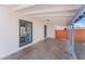 Cozy covered patio with access to the house through gray framed french doors at 6213 Burgundy Way, Las Vegas, NV 89107