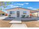 Well-maintained bungalow-style home with tidy landscaping and a covered carport at 6213 Burgundy Way, Las Vegas, NV 89107