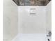 Clean shower stall featuring simulated marble tile with white finish, a built-in soap dish, and modern fixtures at 6213 Burgundy Way, Las Vegas, NV 89107
