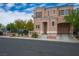 Charming two-story home with a cozy front porch and attached garage, complemented by well-maintained landscaping at 6234 Pangea Ave, Las Vegas, NV 89139