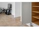 Bright pantry featuring white cabinets and multiple shelves for optimal storage solutions at 6234 Pangea Ave, Las Vegas, NV 89139