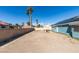 Expansive backyard with a cinder block wall, offering a canvas for landscaping and outdoor living spaces at 6357 Vicuna Dr, Las Vegas, NV 89146