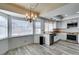 Open concept kitchen with stainless appliances, stylish light fixture, butcher block countertops, and breakfast nook at 6357 Vicuna Dr, Las Vegas, NV 89146