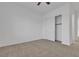 Empty bedroom with carpet, a ceiling fan and closet at 660 Otter Brook St, Henderson, NV 89011