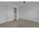 This bedroom features neutral carpet and a closet with sliding doors at 660 Otter Brook St, Henderson, NV 89011