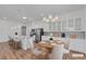 Eat-in kitchen with white cabinets, stainless appliances, granite counters, and a breakfast nook at 660 Otter Brook St, Henderson, NV 89011