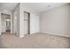 Large bedroom with large closet space and a view into the bathroom, providing ample storage and convenience at 665 Look Lively Ct, Henderson, NV 89011