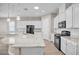 Bright kitchen with granite countertops and ample cabinet space at 665 Look Lively Ct, Henderson, NV 89011