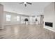 Open living space showcasing hardwood flooring and a bright, airy ambiance at 665 Look Lively Ct, Henderson, NV 89011