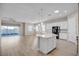 Open-concept living area and kitchen with modern finishes at 665 Look Lively Ct, Henderson, NV 89011