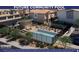 Rendering of the new community pool with sundeck and lounge chairs, perfect for relaxation at 6954 Lynbridge St # Lot 56, Las Vegas, NV 89166