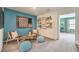 Stylish living room area boasts cozy seating, playful decor, and a bright, inviting atmosphere at 6954 Lynbridge St # Lot 56, Las Vegas, NV 89166