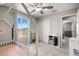 Comfortable bedroom boasts a house bed, plush carpet, closet, and serene window views at 70 Pikiariki Ct, Las Vegas, NV 89183