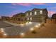 Charming neighborhood home, landscaped front yard, paver driveway, and two-car garage at 70 Pikiariki Ct, Las Vegas, NV 89183