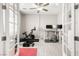 Home office with a ceiling fan, french doors and workout equipment at 70 Pikiariki Ct, Las Vegas, NV 89183