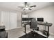 Well-lit office space, tiled floor, large windows, and functional work space at 70 Pikiariki Ct, Las Vegas, NV 89183