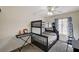 Functional bedroom featuring bunk beds, a window, and a desk at 702 Carlitos Ave, North Las Vegas, NV 89031