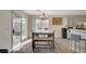Dining area features sliding glass doors to the backyard at 702 Carlitos Ave, North Las Vegas, NV 89031
