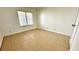 This bedroom features tile flooring and ample natural light at 7100 Pirates Cove Rd # 1022, Las Vegas, NV 89145