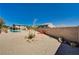 The backyard is a private oasis with a pool and relaxing fire pit at 7736 Tioga Ridge Ct, Las Vegas, NV 89117
