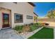 Exterior of home showcasing the backyard, patio area, and desert landscaping at 7736 Tioga Ridge Ct, Las Vegas, NV 89117