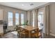 Sun-filled dining area with access to the backyard, conveniently located near the kitchen at 7736 Tioga Ridge Ct, Las Vegas, NV 89117