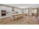 Spacious kitchen featuring an expansive island, stainless steel appliances, and modern finishes at 7736 Tioga Ridge Ct, Las Vegas, NV 89117